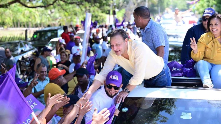 PLD realiza caravana en provincias del Noroeste
